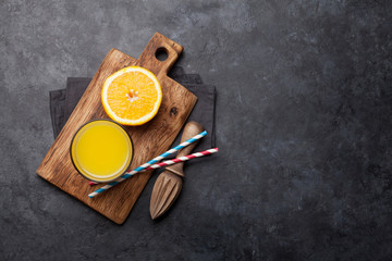 Fresh orange juice and oranges