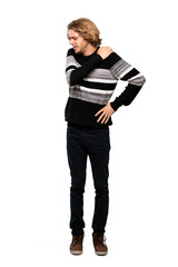 Full-length shot of Blonde man suffering from pain in shoulder for having made an effort over isolated white background
