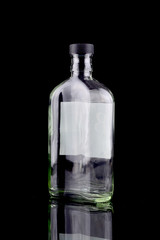 Empty bottle isolated in black