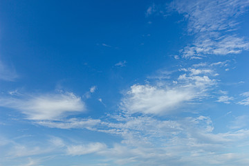 A view of a majestic blue sky with beautiful white clouds © Dolwolfian