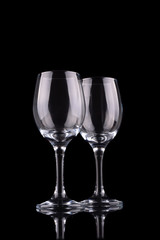 Empty wine glass isolated on black