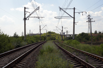 Railway for trains and electric trains