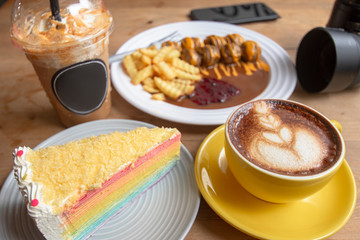 meatballs with brown sauce ,coffee and mille crepe rainbow cake