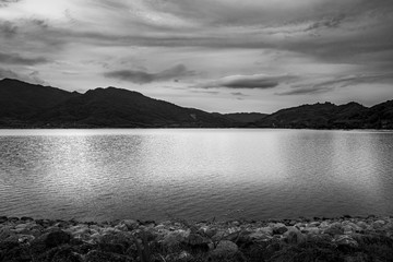 View of landscape nature and river with mountain and sunlight in twilight, Black and white and monochrome style