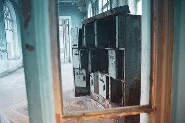 empty storage boxes in an abandoned building