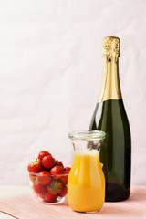 Mimosa cocktail and strawberries