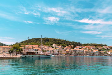 Fototapeta na wymiar Coast of Korcula town on the island. Ship in the harbour. Croatia. Summer travel concept.