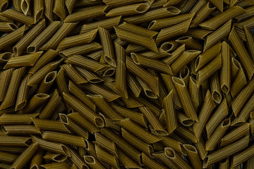 Detail of natural spinach Penne ready for cooking.