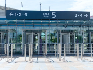 Modern stadium pass system. Entrance to the stadium. Automatic baffle gate. Barriers, security...