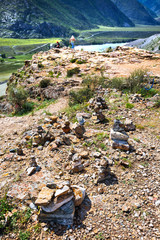 Tourists on the mountain slopes. Altai Republic, Russia