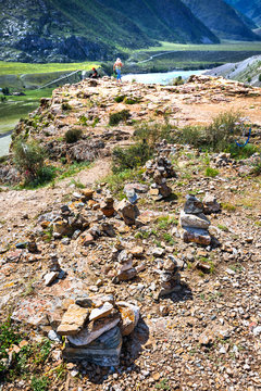 Tourists on the mountain slopes. Altai Republic, Russia