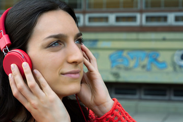 Young woman listening to music