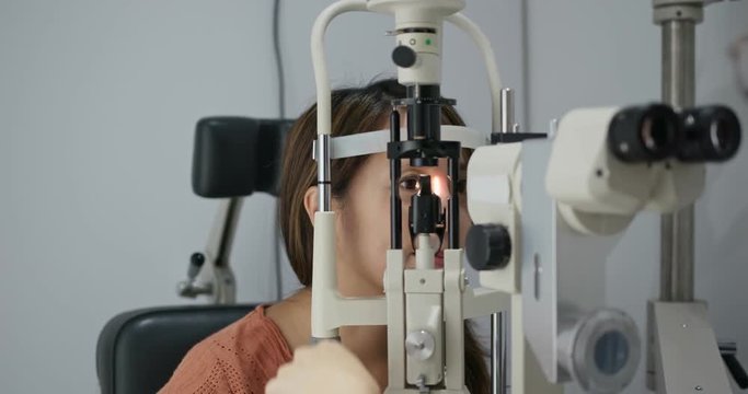 Woman check on eye in clinic