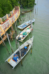 Fototapeta na wymiar Boats park at jetty