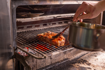 Food concept - Steak is coated with sauce