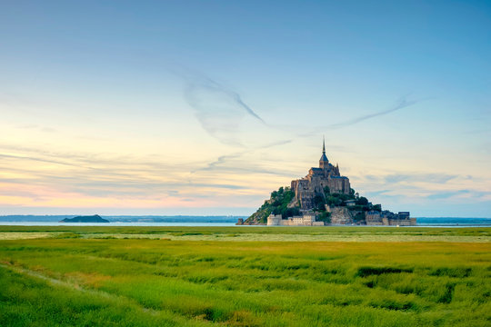Scenic view of Mont Saint Michel against cloudy sky