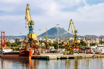 Fototapeta na wymiar .View of Ships ,cranes and containers in the port of Heraklion in Crete