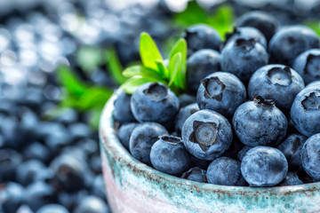 Fresh blueberries background with copy space for your text. Blueberry antioxidant organic superfood in a bowl concept for healthy eating and nutrition - Powered by Adobe