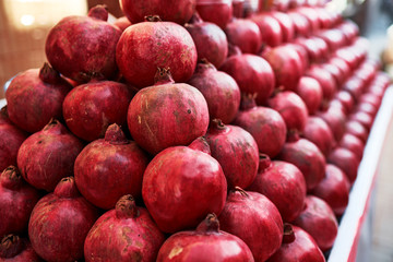 Group of pomegranates. Pomegranate closeup, background.