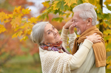 Portrait of happy senior woman and man