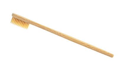 Bamboo toothbrush on white background. Eco-friendly bamboo toothbrush.