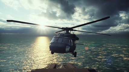 Military helicopter Blackhawk lands on an aircraft carrier in the endless blue ocean. 3D Rendering © designprojects