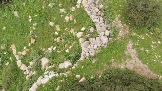 The ruins of the late Hellenic Jewish settlement Hurvat Sumak on Mount Carmel, Israel. View from the drone.