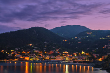Fototapeta premium Night city of Bonassola La Spezia, Italy. The picture was taken on a long exposure.