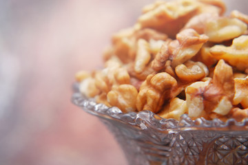 Walnuts on the background imitating the old peeling paint.