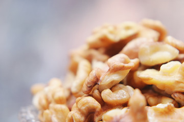 Walnuts on the background imitating the old peeling paint.