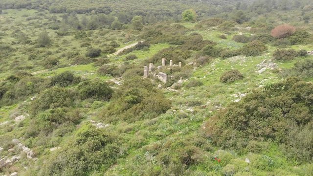 The ruins of the late Hellenic Jewish settlement Hurvat Sumak on Mount Carmel, Israel. View from the drone.