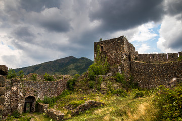 Fototapeta na wymiar Interior of ruins of medieval fortress Maglic on top of hill by the Ibar river in Serbia. Valley of this river is also called Lilac valley.