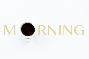Cup of coffee and word morning on white background. Flat lay style. Coffee concept. Useful image for design. Good morning wake up awake concept