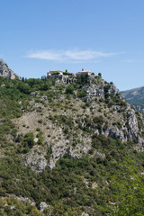 Fototapeta na wymiar View of mountain top village Gourdon in Provence, France. Gourdon is listed under the most beautiful villages of France.