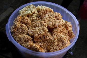 Traditional crisp crackers names rengginang Indonesian snack made of deep-fried rice