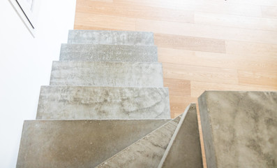 Minimal and modern home interior, with a concrete block stair