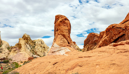Fototapeta na wymiar Valley of fire state park, Nevada USA. Red sandstone formations, blue sky with clouds