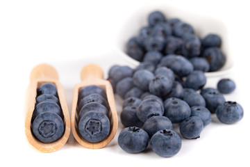 Tasty ripe blueberry fruit on the kitchen table. Ingredients for a delicious dessert in the home kitchen.