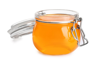 Tasty jelly dessert in glass jar on white background