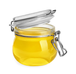 Tasty jelly dessert in glass jar on white background