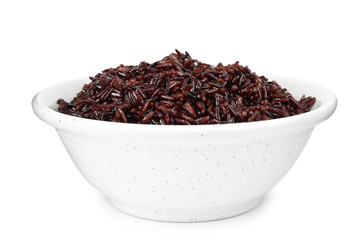Bowl with delicious cooked brown rice on white background