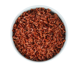 Bowl with delicious cooked brown rice on white background, top view