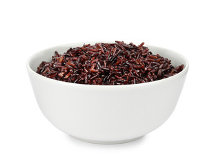 Bowl with delicious cooked brown rice on white background