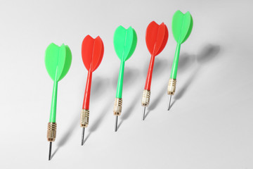 Bright color dart arrows for game on white background