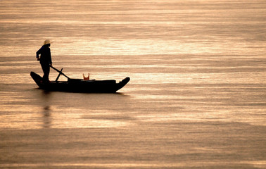 Fishing boats in the river, Kampong Chanang Cambodia