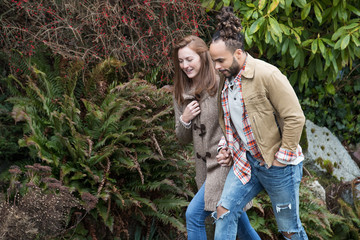 Couple walking together outside 