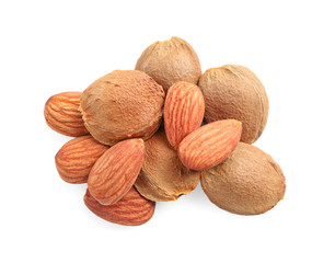 Organic dried apricot kernels on white background, top view
