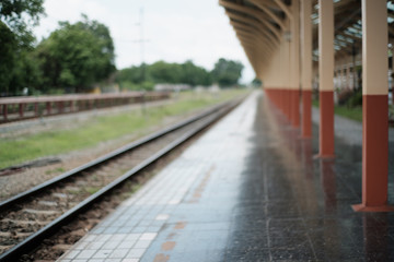 Fototapeta na wymiar Blurred of railway tracks at train station,abstract for background