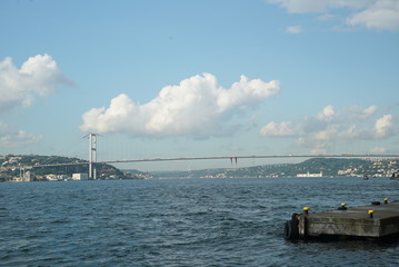Fototapeta premium Istanbul Bosphorus skyline in cloudy weather. bridge and silhouette of istanbul