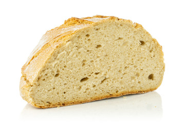 One half of fresh baked rye wheat bread isolated on white background